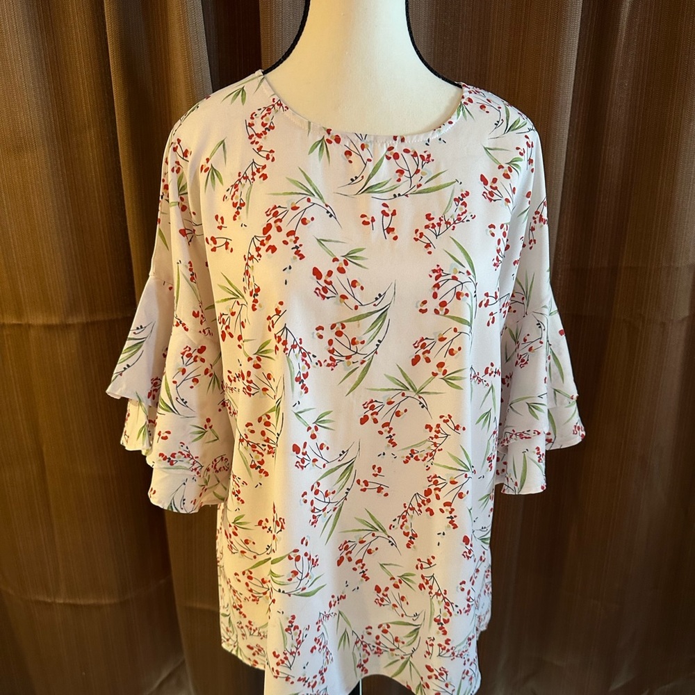 Pull over bell sleeve blouse size L.